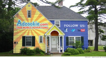 House painted with ads